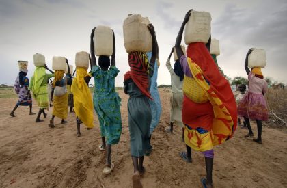 Women carrying water on their heads