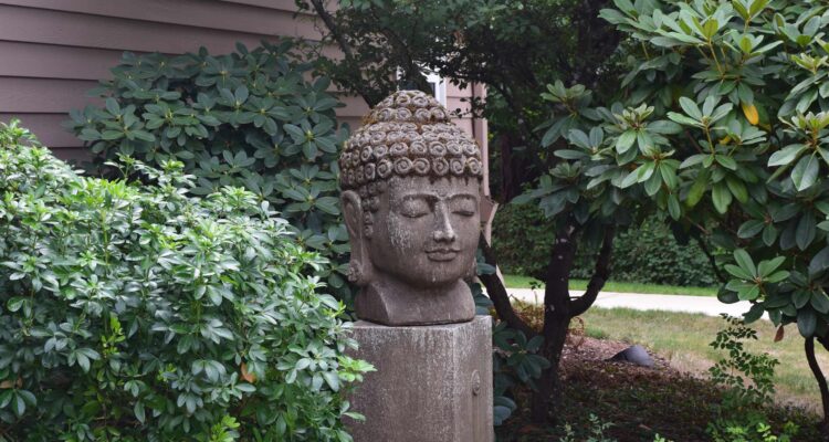 Head of Buddha statue in UUCS garden